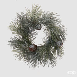 Couronne enneigée avec pomme de pin